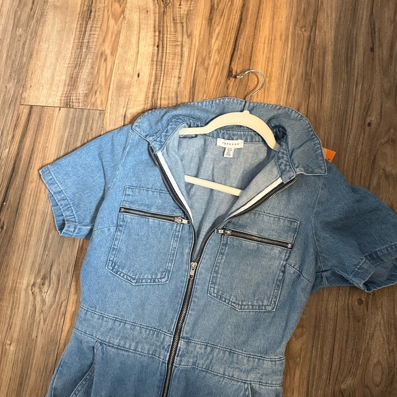 Topshop is a store the TV star often heads to. denim jumpsuit, - Picture 3 of 8